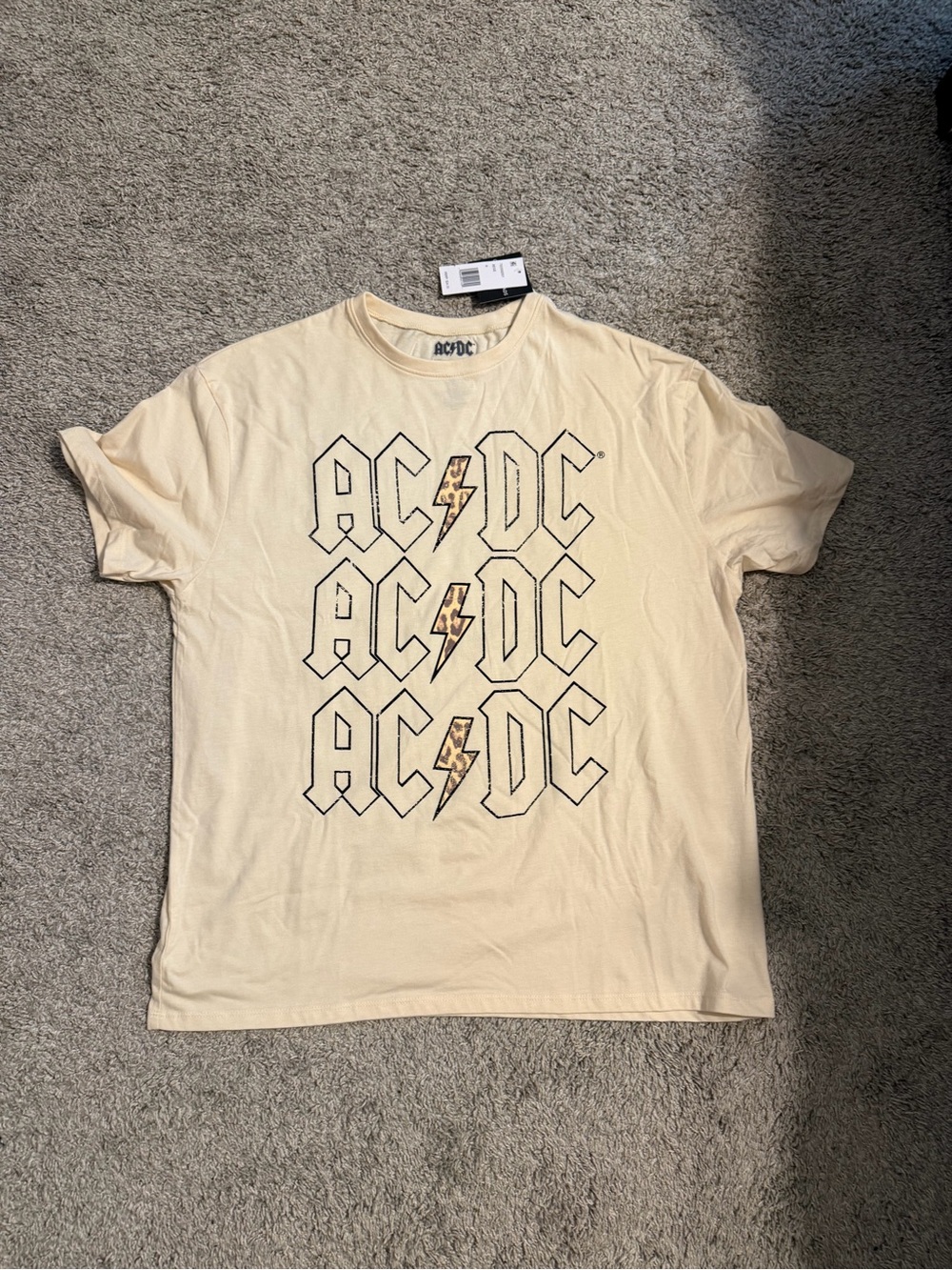 AC/DC Cream Tee with Black Logo and Gold Bolt Accents